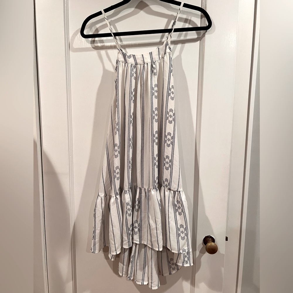 Like New! XS white cotton/poly flowy dress with navy ikat print. Rope tie back